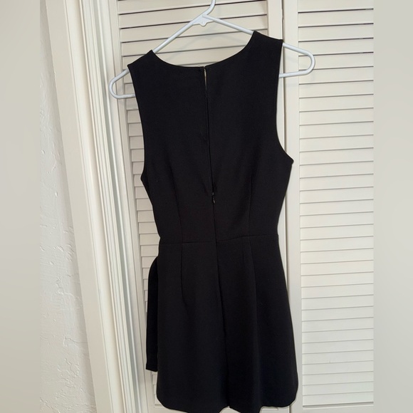 BCBGeneration Black Sleeveless wrap tie front skort romper - Picture 2 of 3
